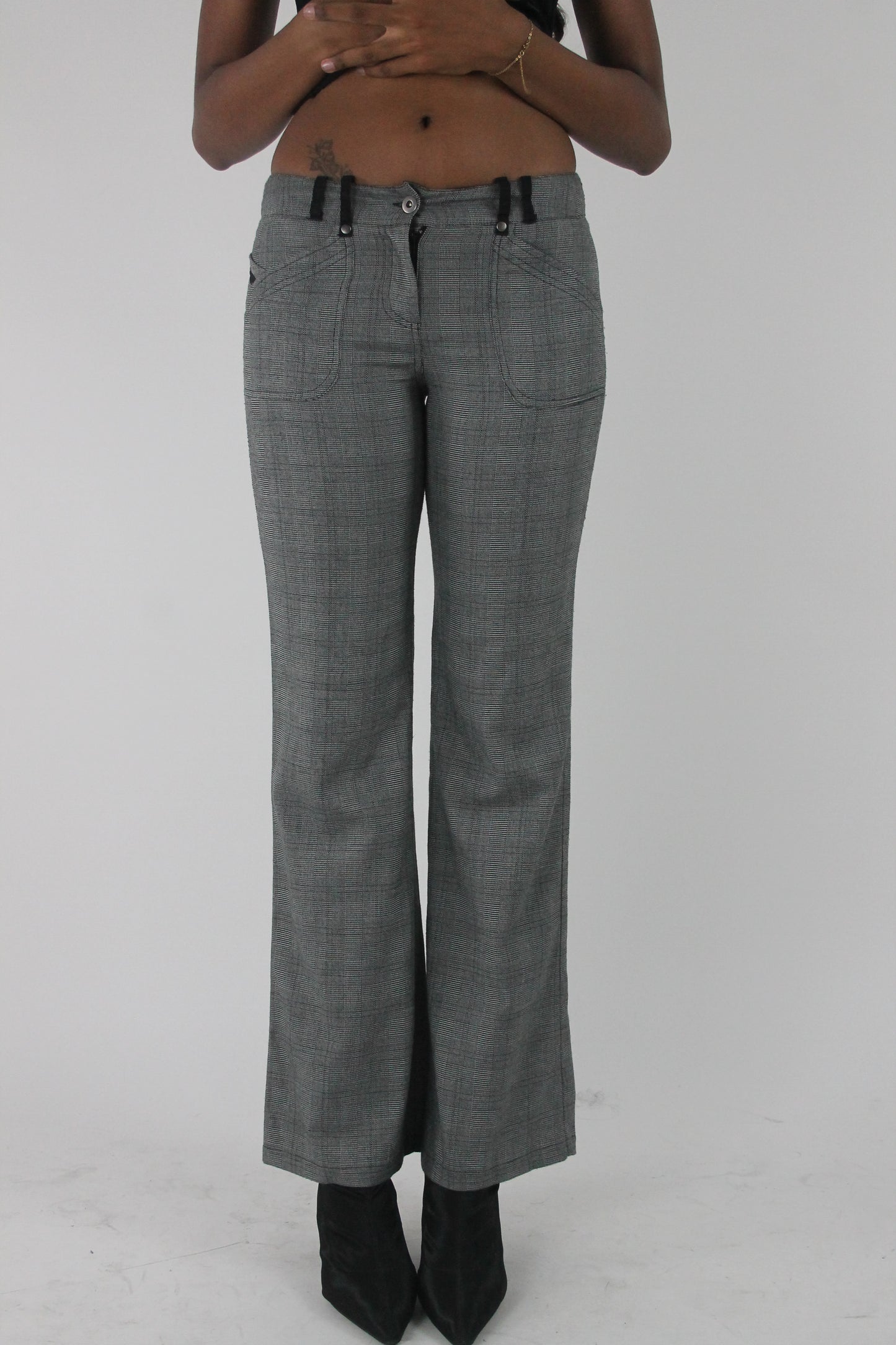 front view of grey check bootcut trousers