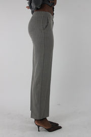 side view of grey pinstripe straight-leg trousers