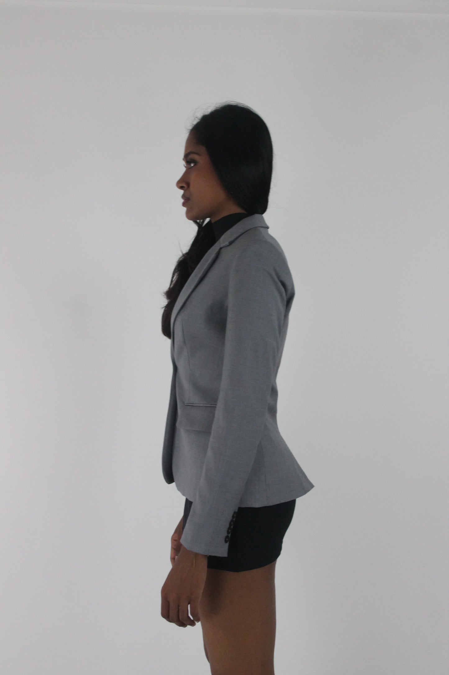 alternate-side view of grey single-button fitted blazer