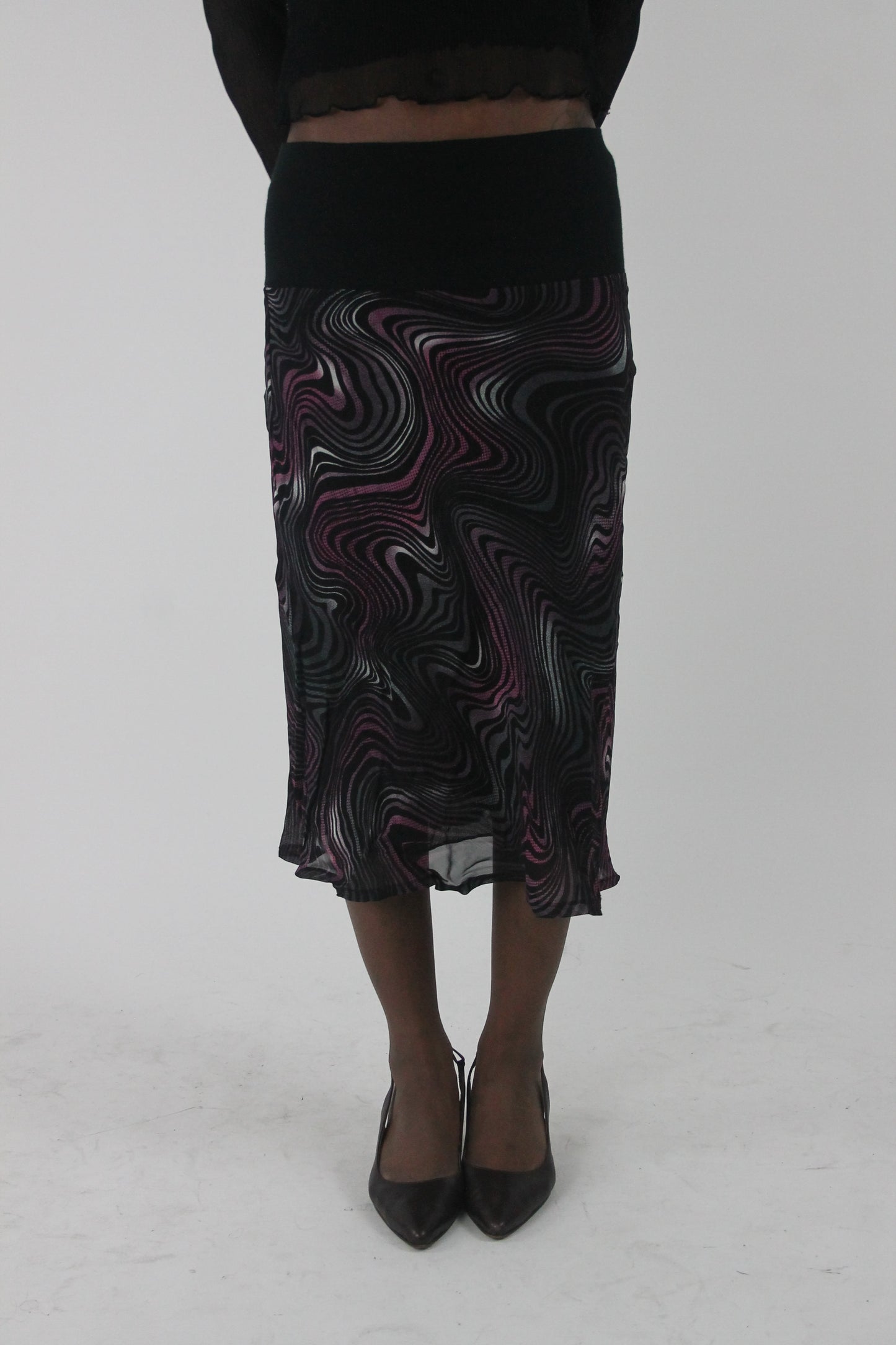 detail view of pink purple and white swirl-print mesh midi skirt