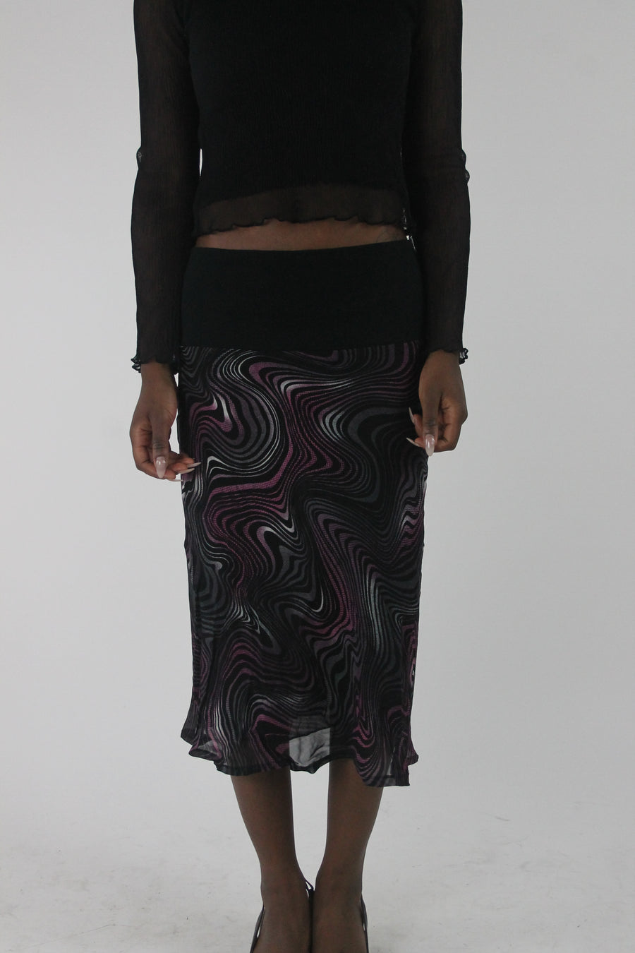 front view of pink purple and white swirl-print mesh midi skirt