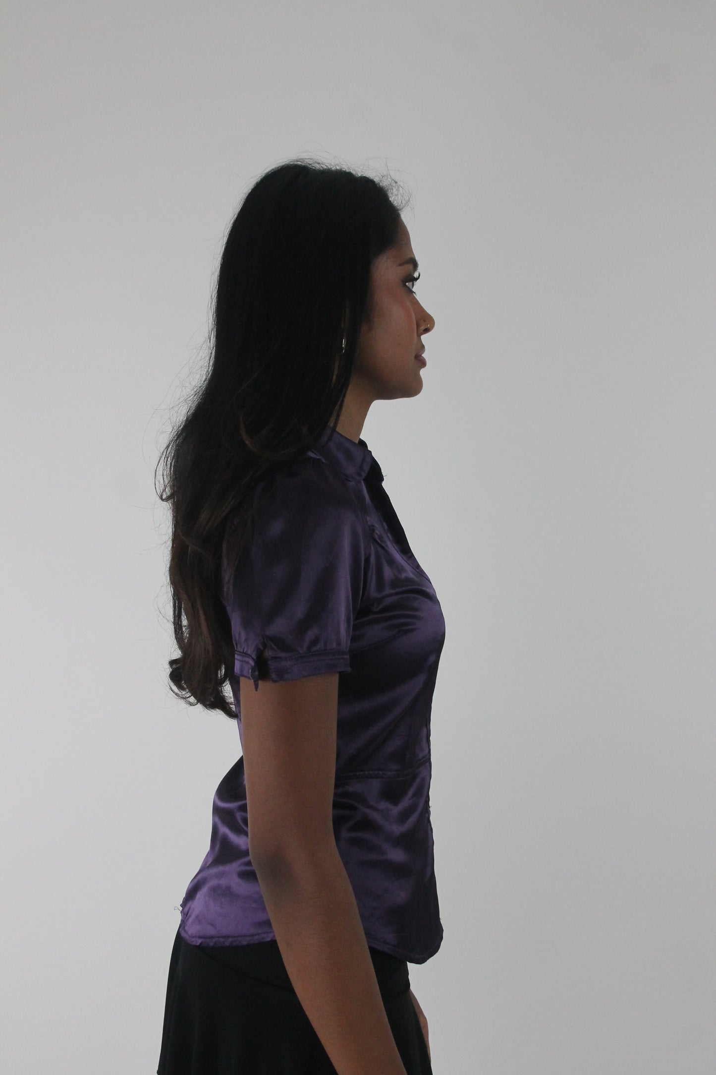 side view of purple satin-effect fitted short-sleeve shirt