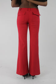 back view of red flap-pocket flared trousers
