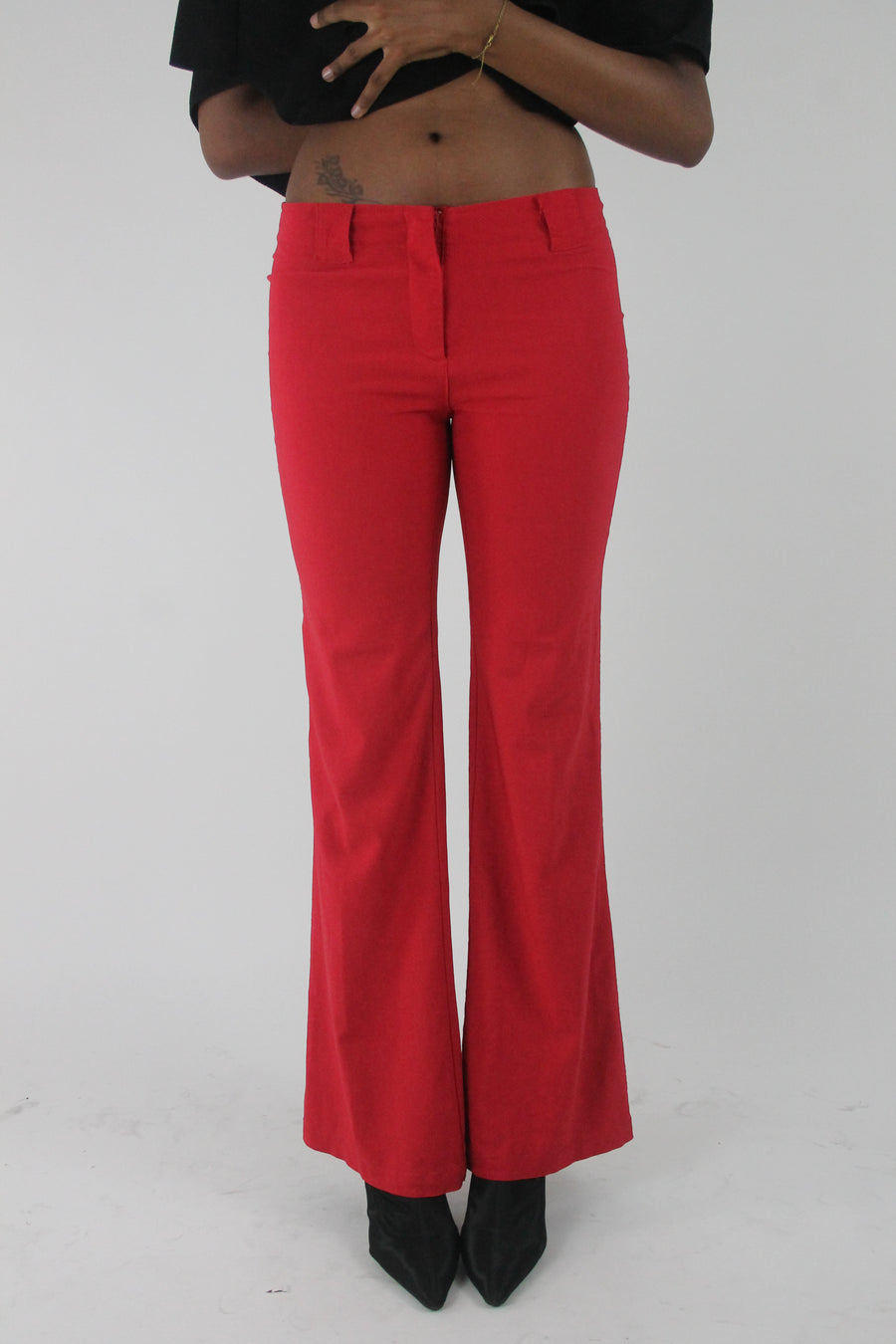 front view of red flap-pocket flared trousers