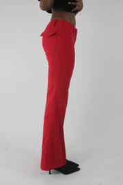 side view of red flap-pocket flared trousers