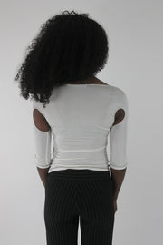 back view of white cold-shoulder tie-front top