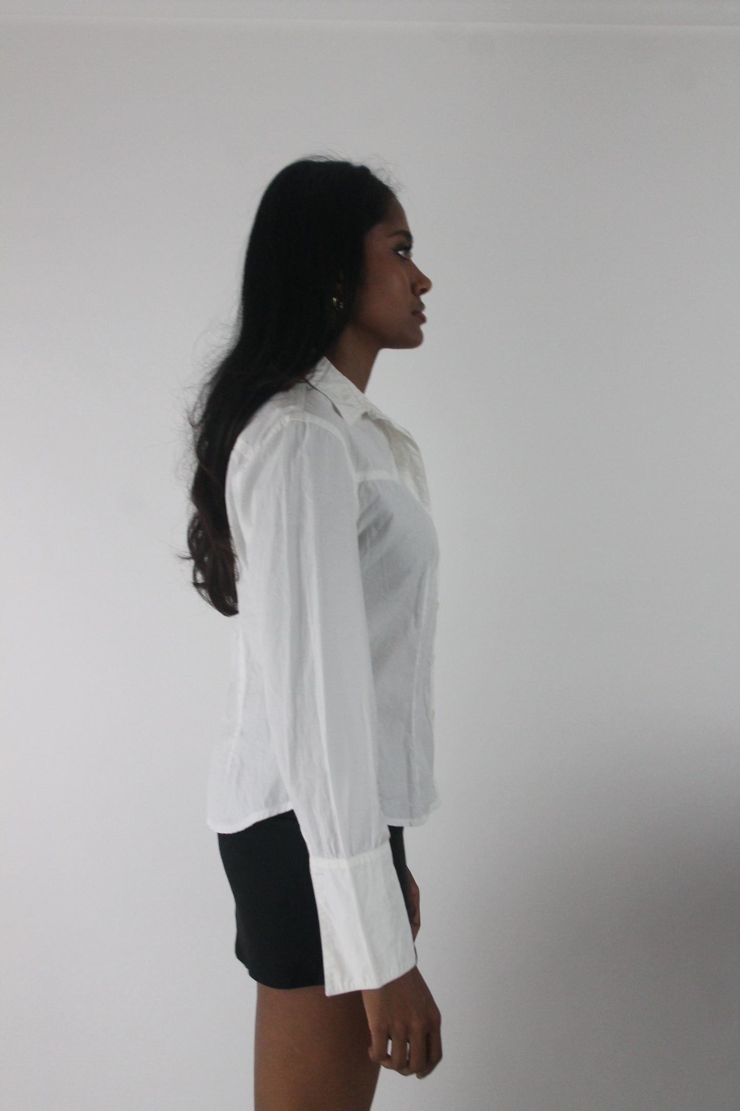 alternate-side view of white fitted long-sleeve button-up shirt