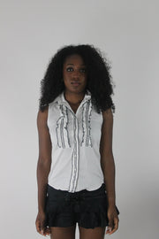 front view of white sleeveless collared shirt with black piping