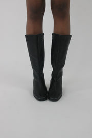 front view of black knee-high block-heel boots