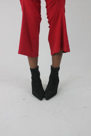 front view of black pointed-toe stiletto ankle boots