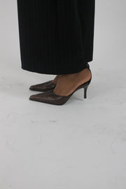 front view of brown pointed-toe slingback kitten heels