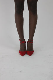 front view of red pointed-toe strappy stiletto heels