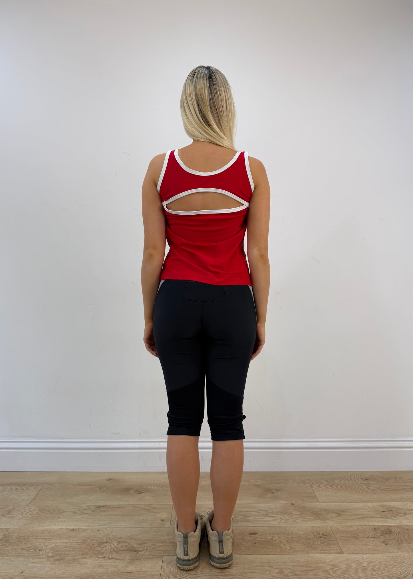 medium red tank top with cut out back detail