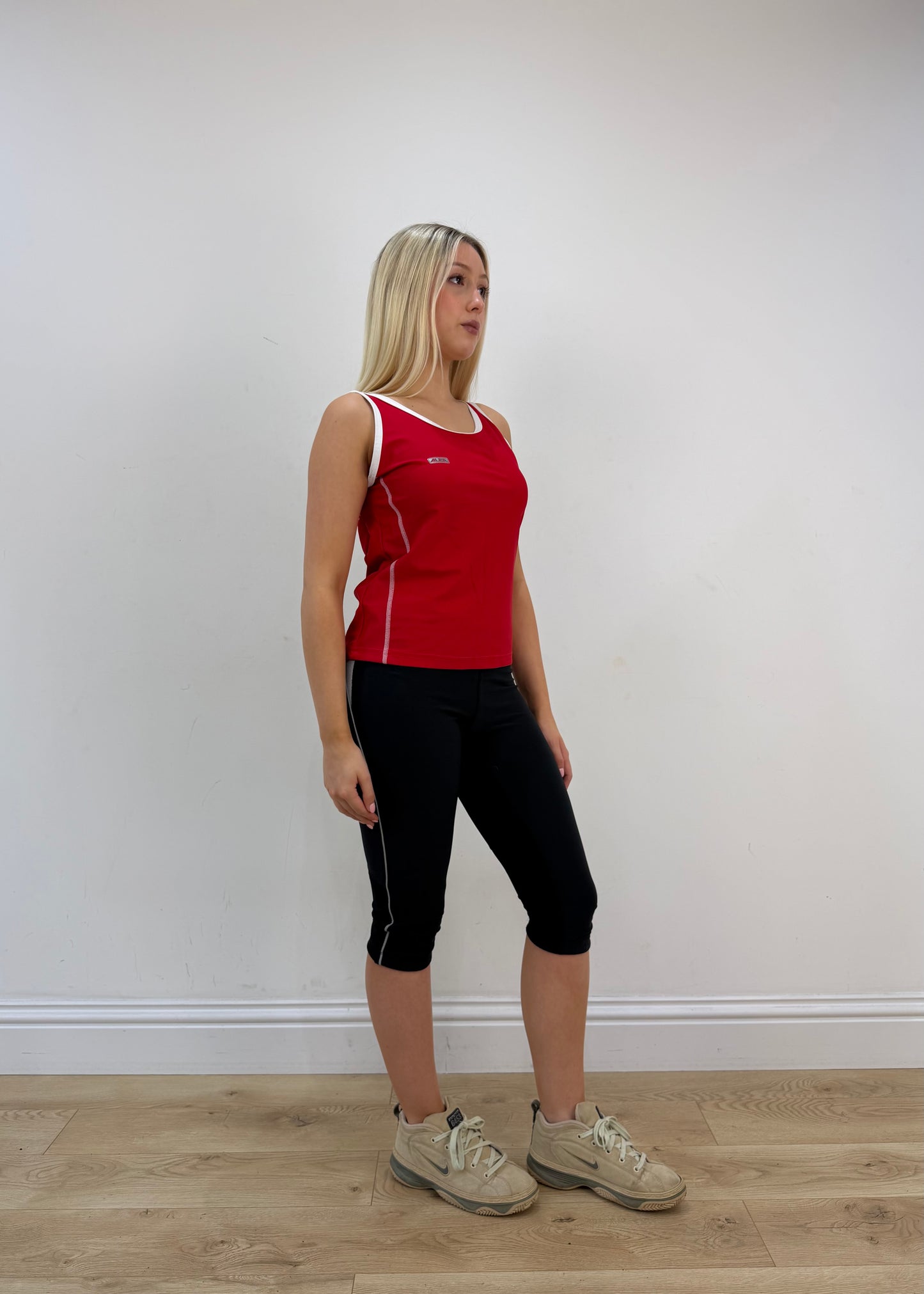medium red tank top with cut out back detail