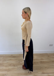 small beige long sleeve top side