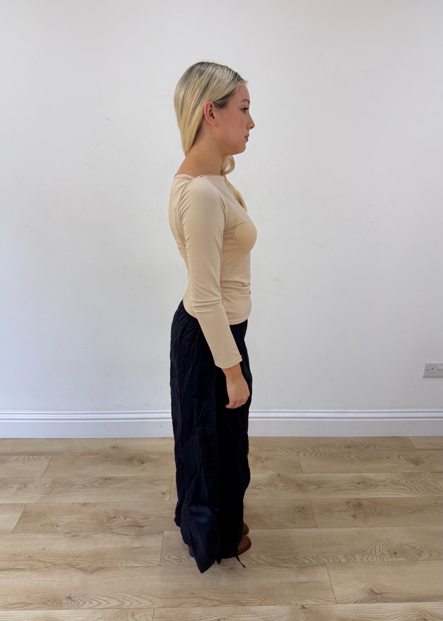 small beige long sleeve top other side