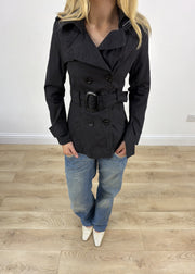 small black high neck trench coat aesthetic detail