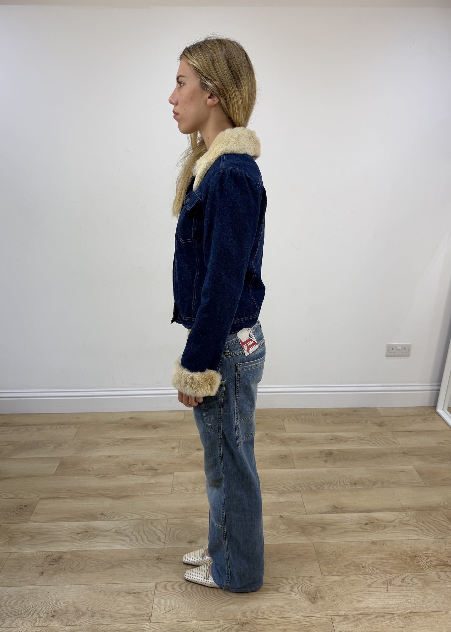 small blue denim faux fur jacket left side