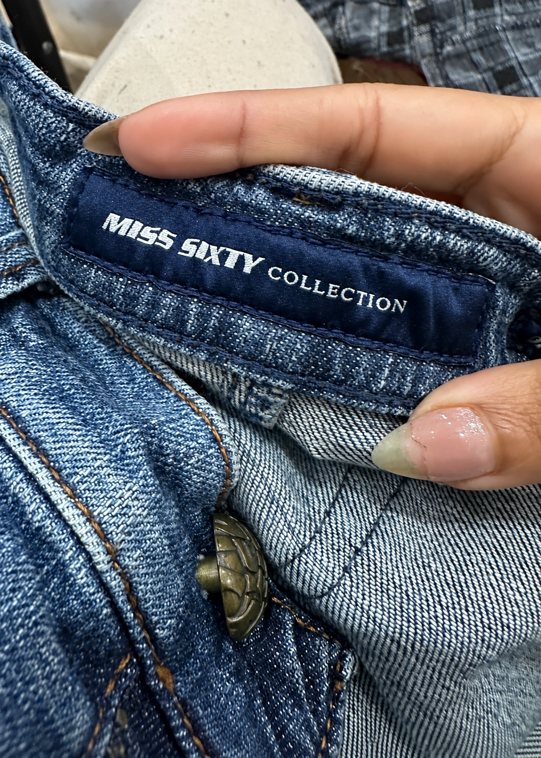small blue Miss Sixty jeans brand label