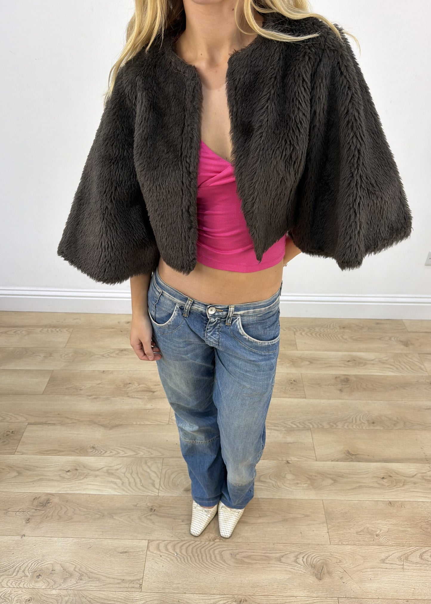 small brown faux fur cape aesthetic detail
