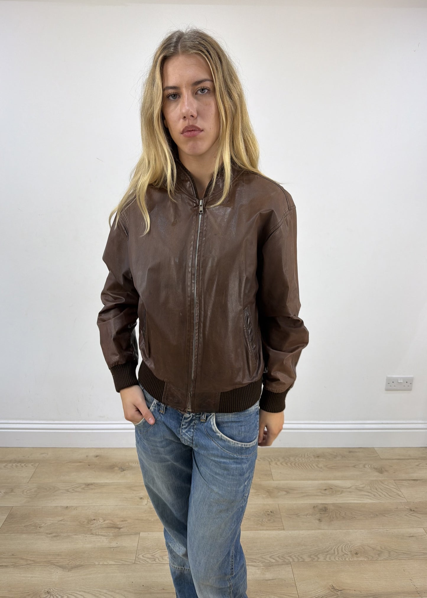 small brown faux leather bomber jacket close front