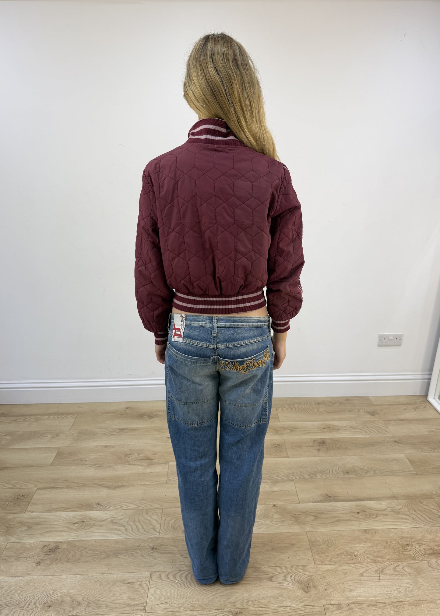 small burgundy fishbone varsity jacket back