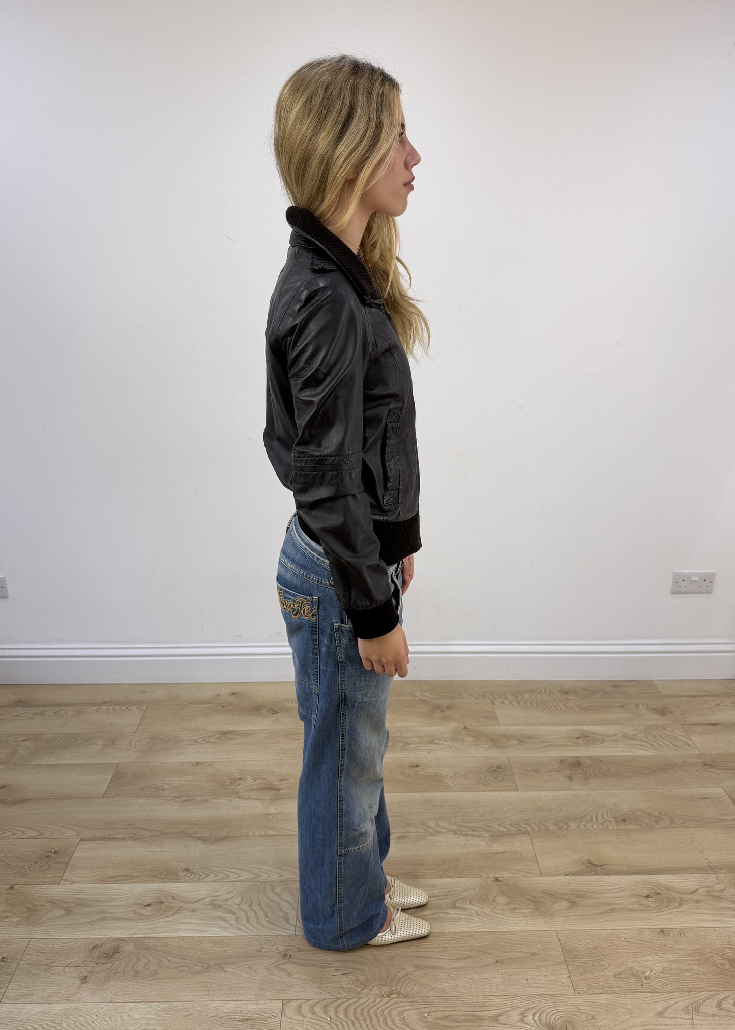 small dark brown zara faux leather jacket right side
