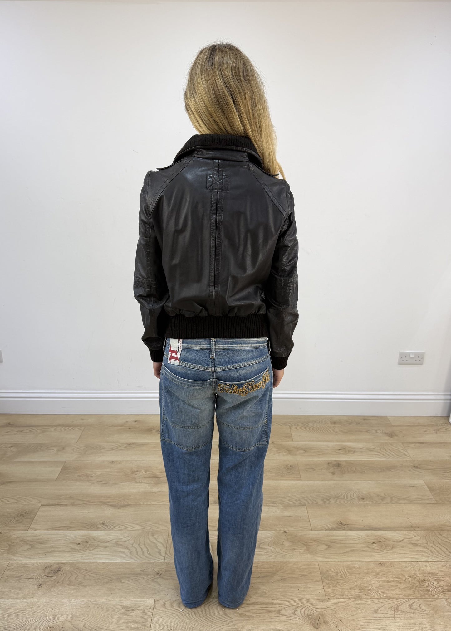 small dark brown zara faux leather jacket back