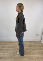 small grey acid wash denim jacket left side