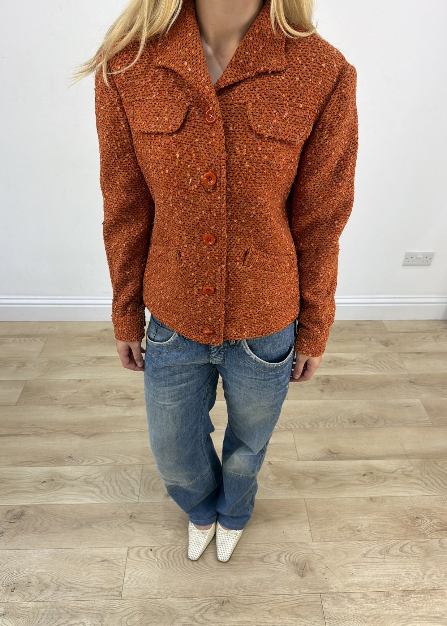 small orange borgofiori tweed jacket aesthetic detail