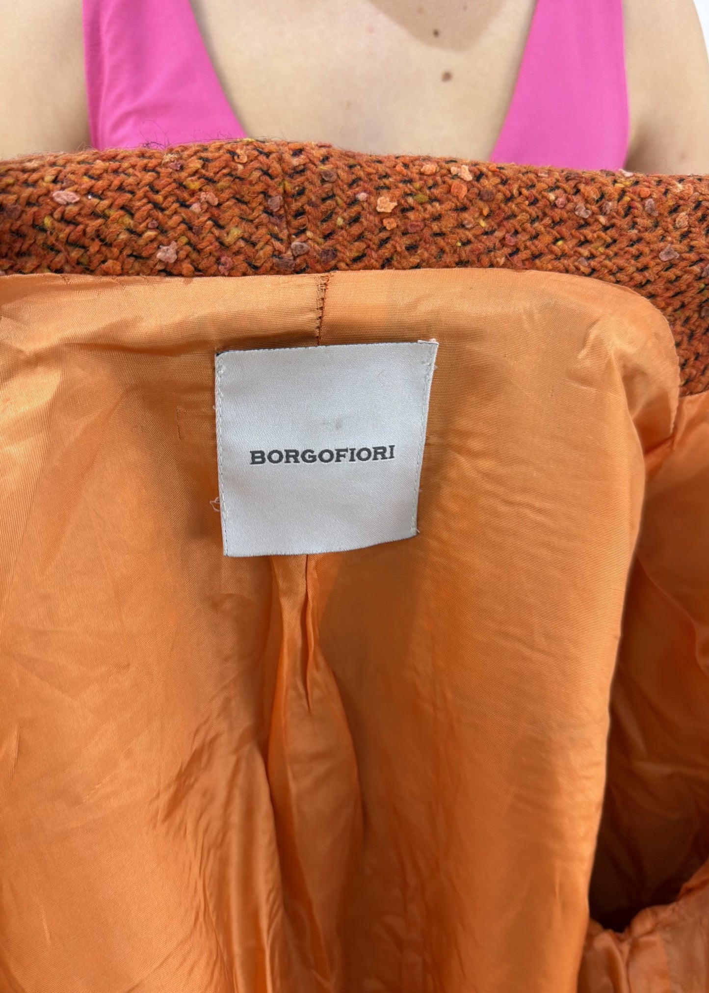 small orange borgofiori tweed jacket label