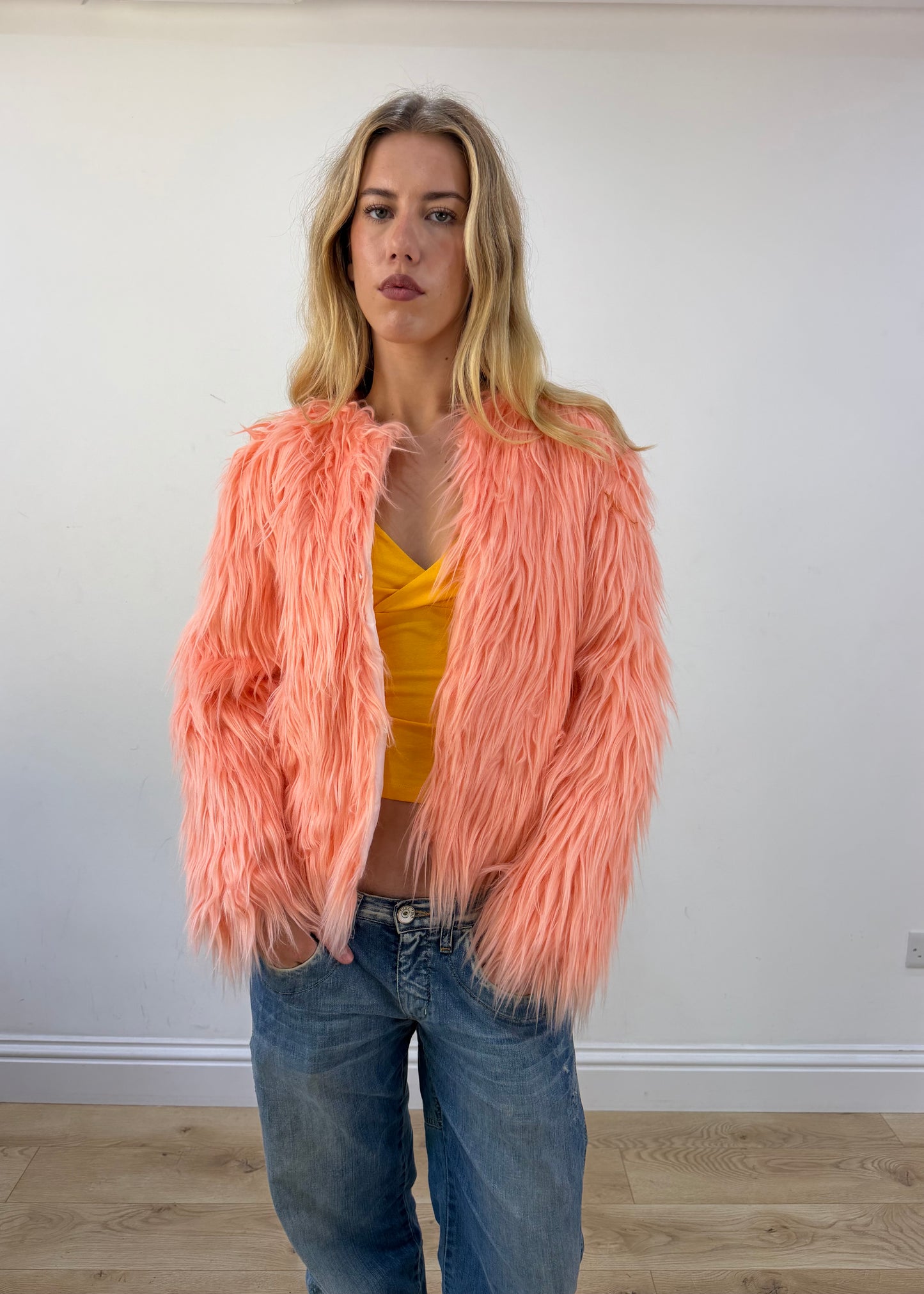 small peach pink faux fur coat