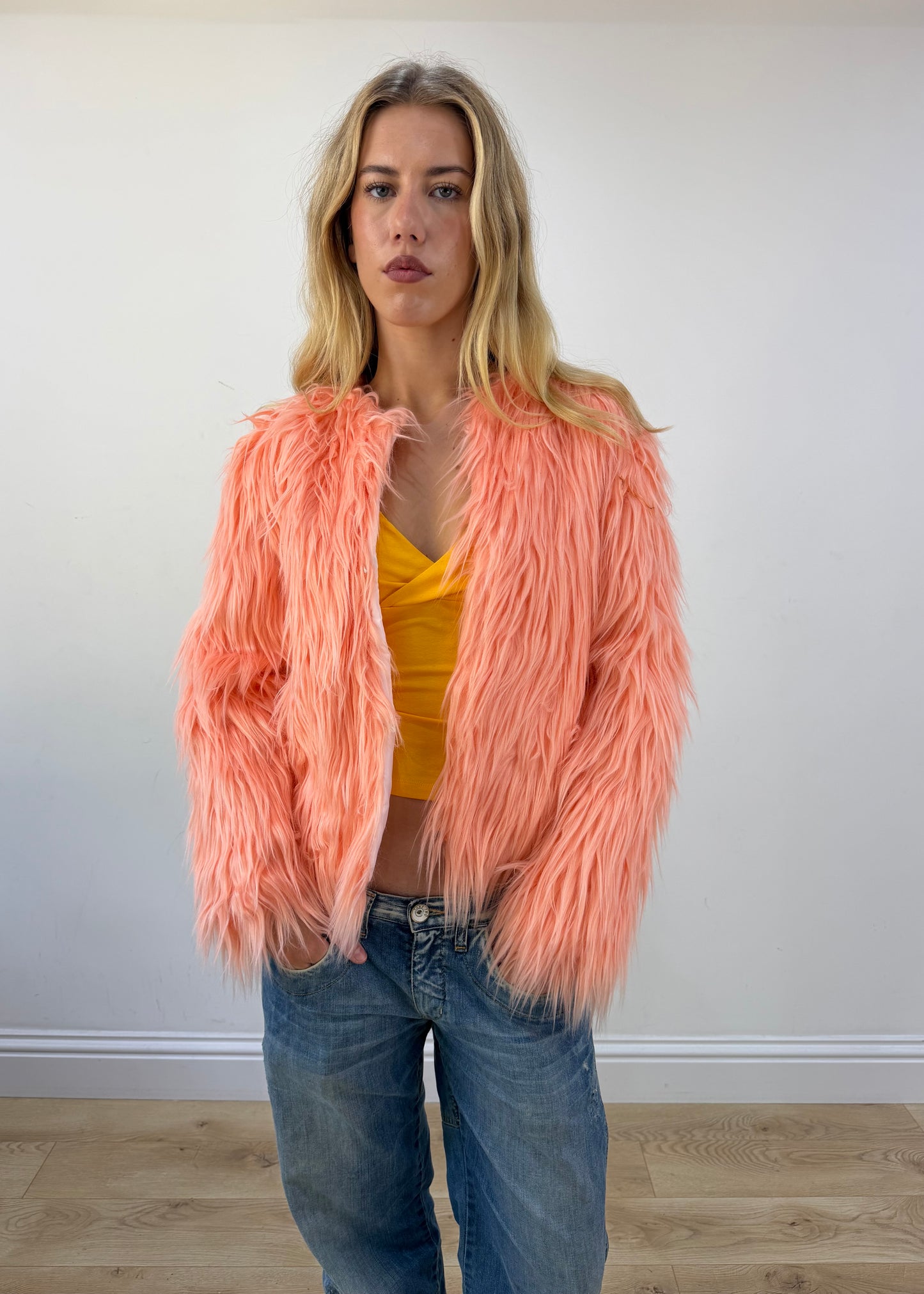 small peach pink faux fur coat