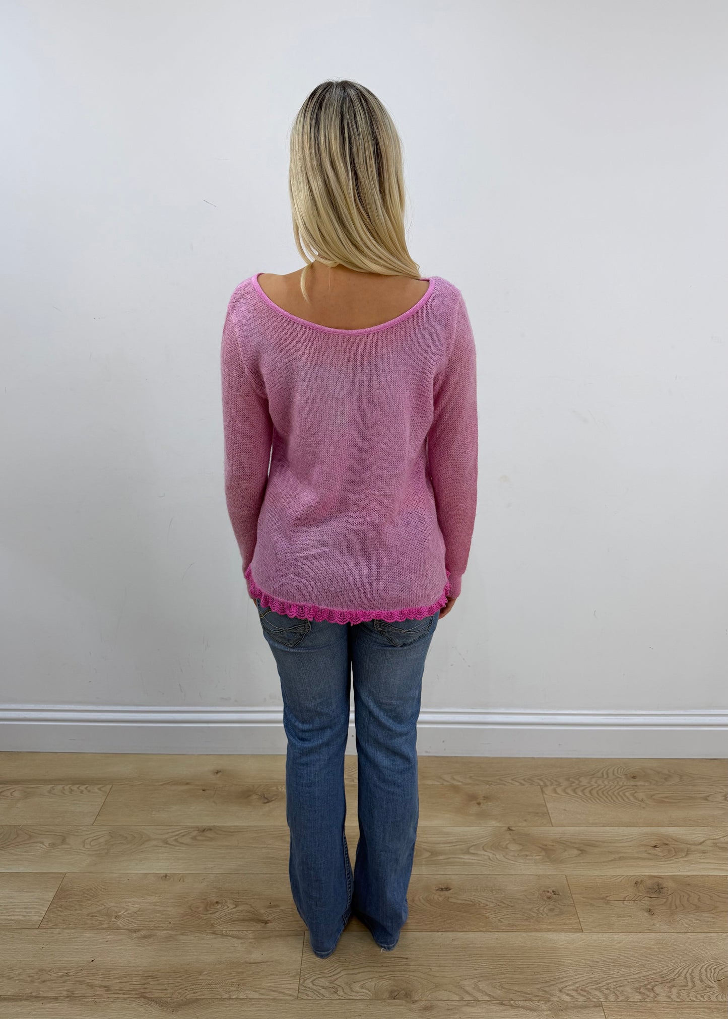 small pink sheer knit jumper back view