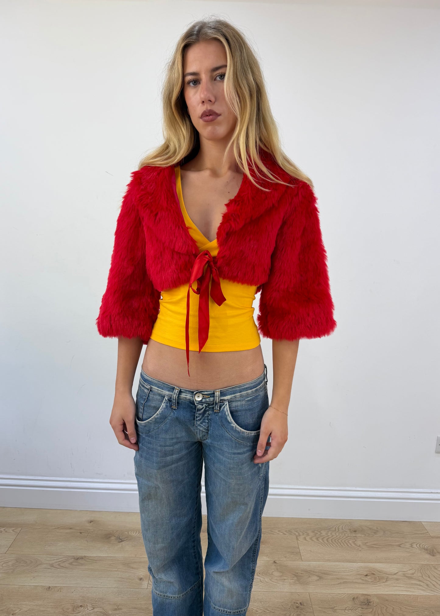 small red faux fur cropped shrug