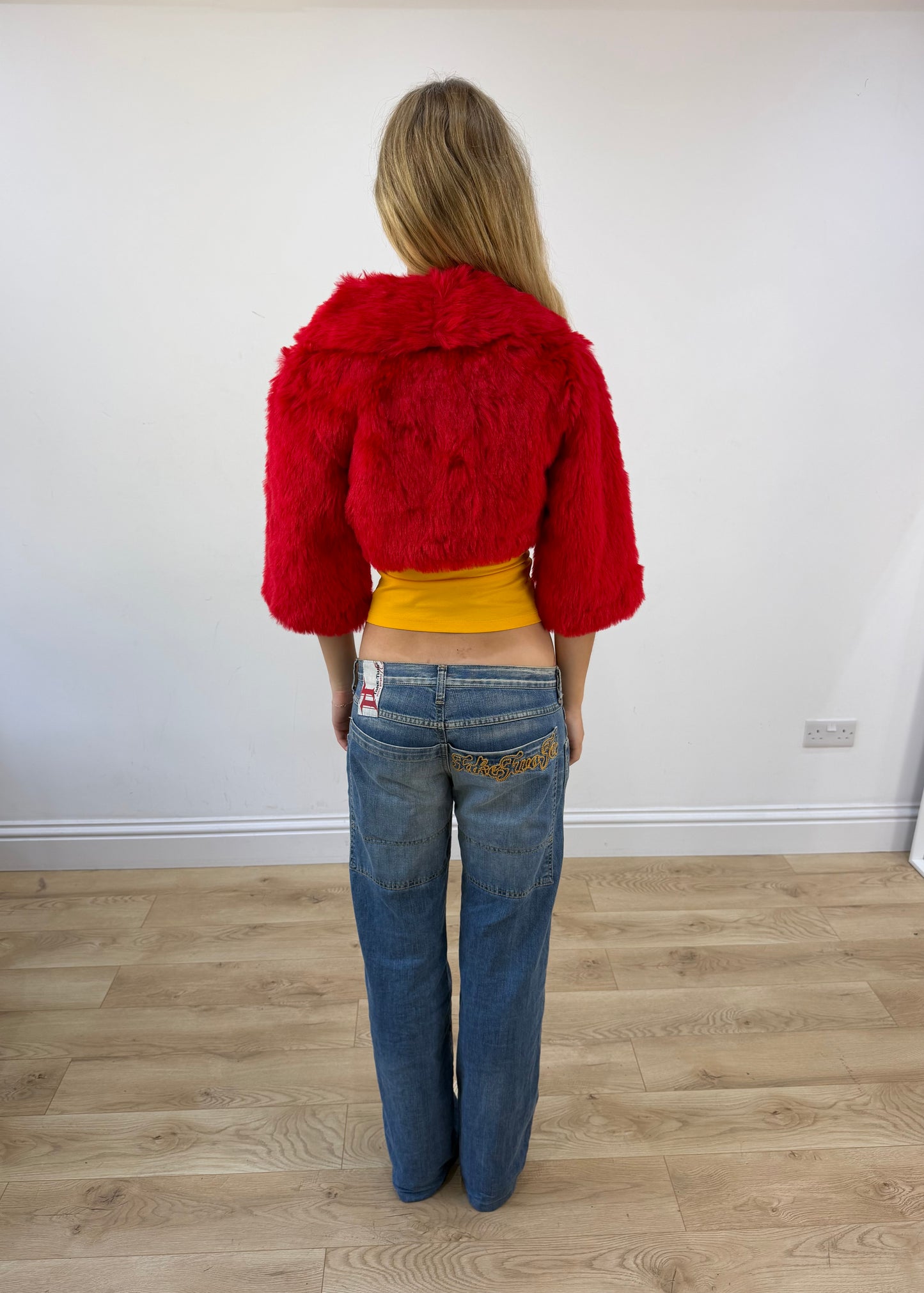 small red faux fur cropped shrug