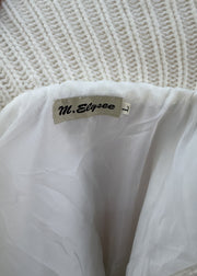 small white m. elysee puffer jacket label