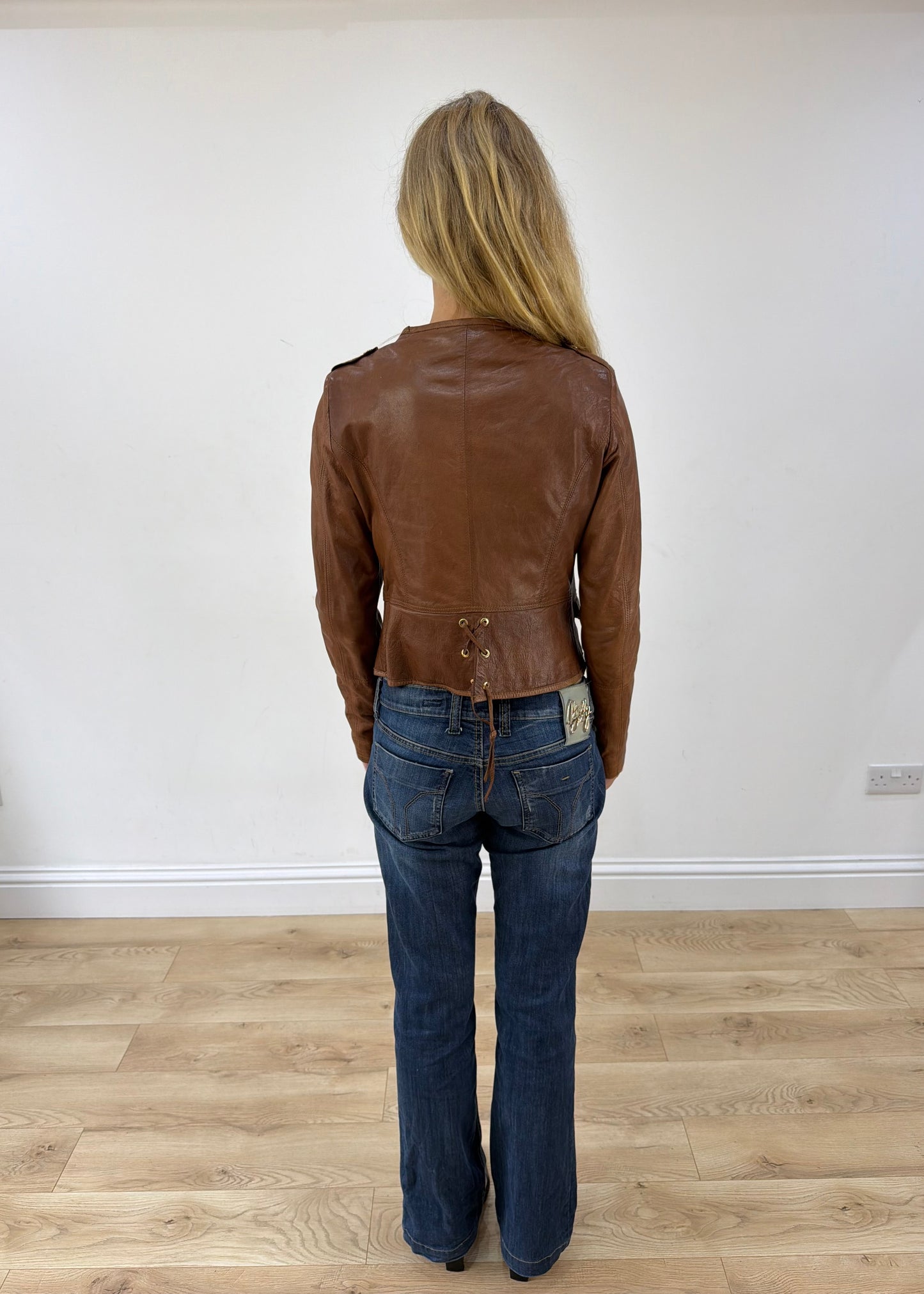 small brown faux leather fitted jacket back view