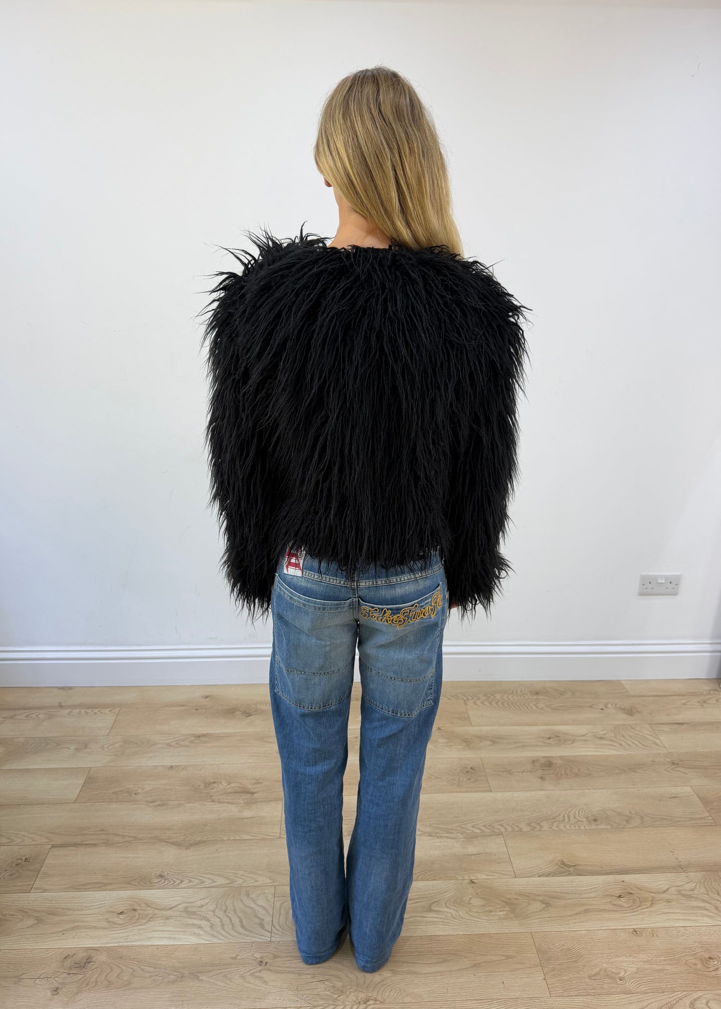 small black coocu shag fur jacket back