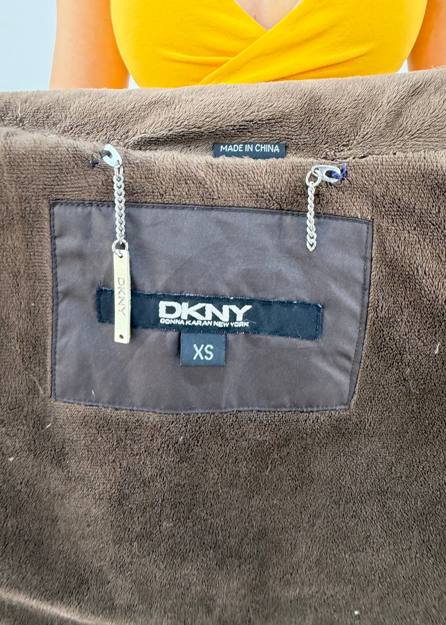 small brown dkny puffer trench coat label detail
