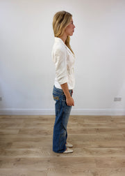 small white belted blazer opposite side