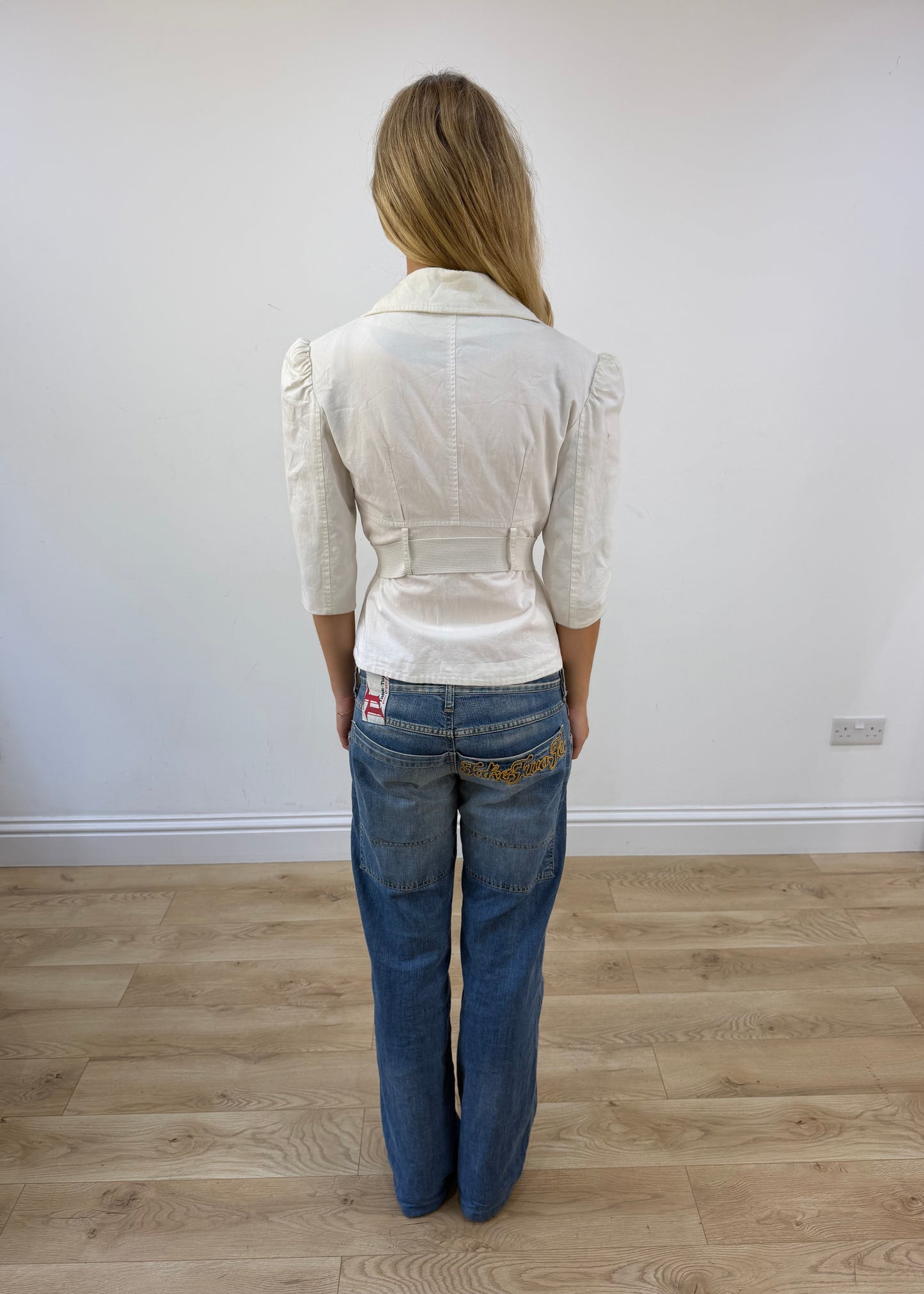 small white belted blazer back