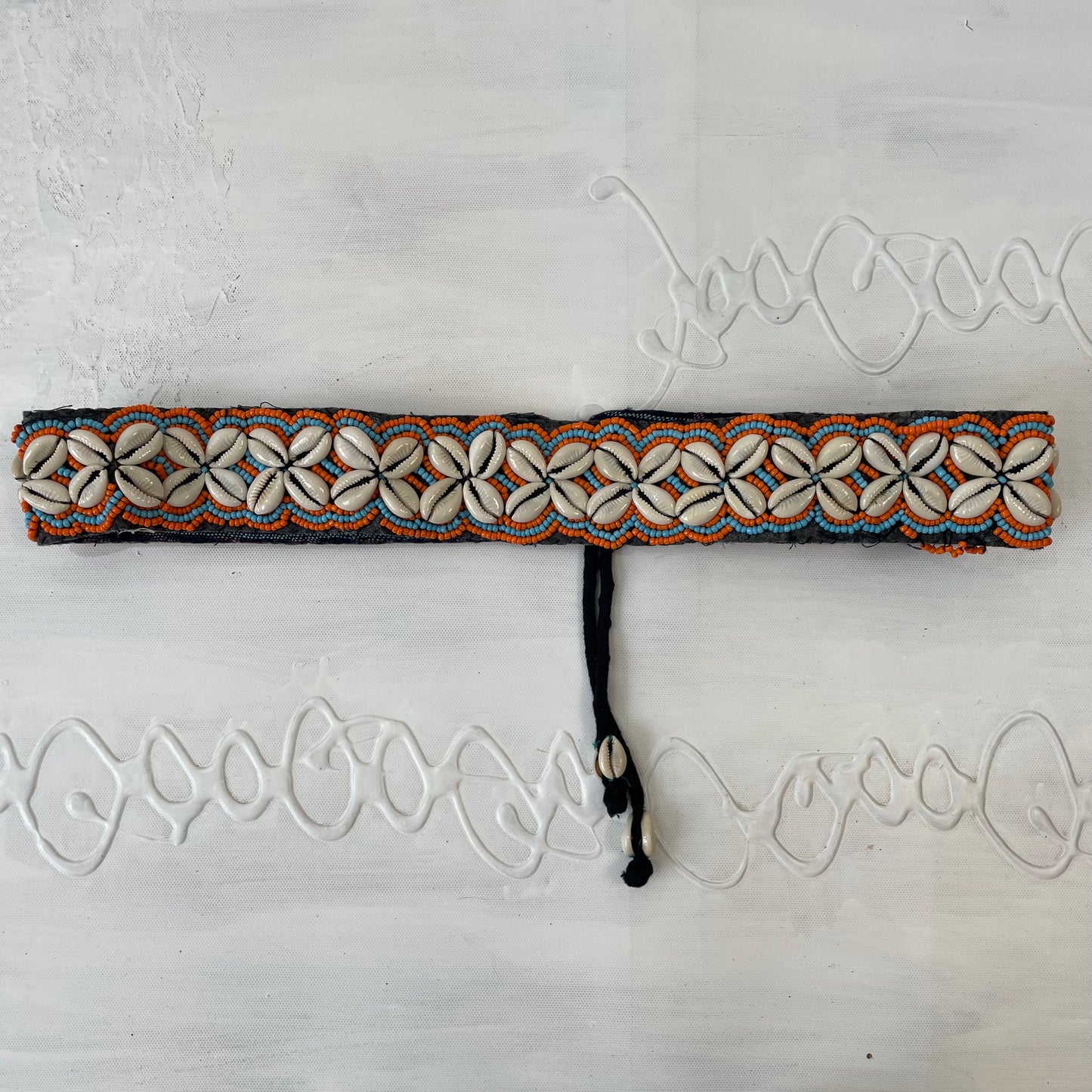 orange and blue shell belt