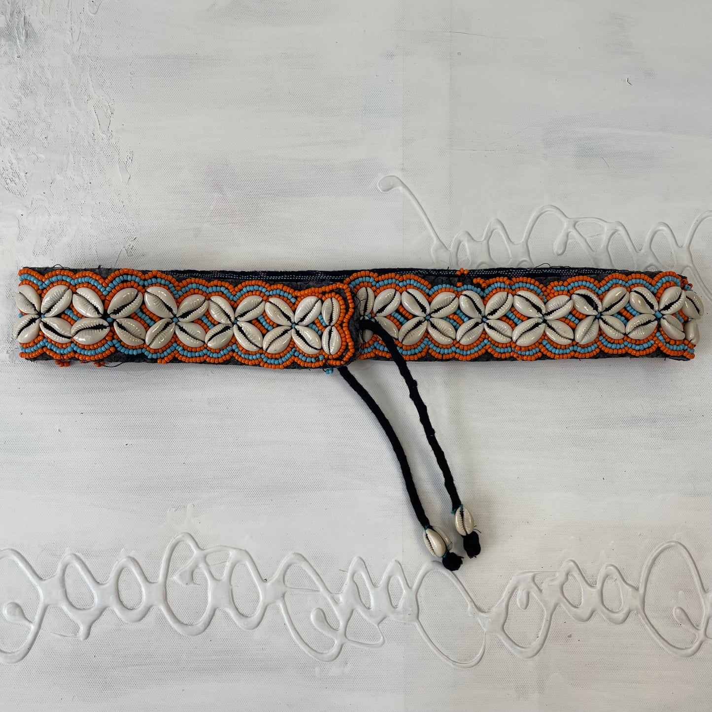 orange and blue shell belt