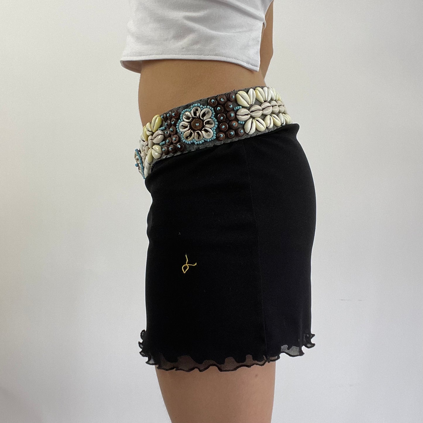 brown, blue and cream shell belt